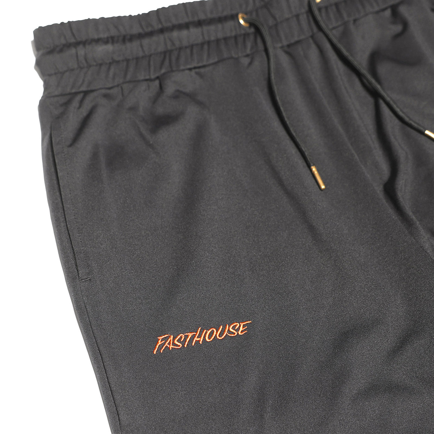 Fasthouse Women's Estrella Fleece Jogger Black - Close-up of Stitched Logo on Front