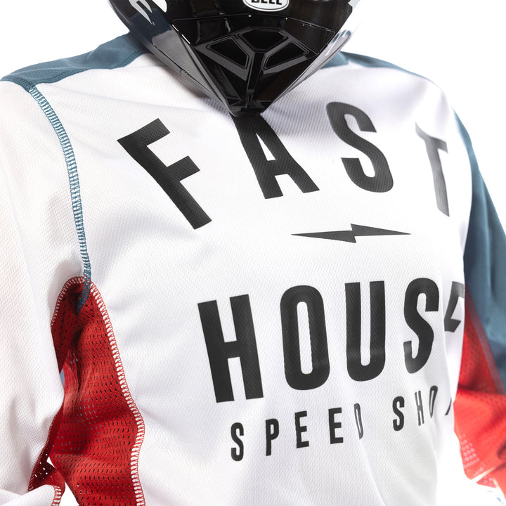 Fasthouse Women's Grindhouse Anthem Jersey White/Teal - Close-up of Chest Graphics