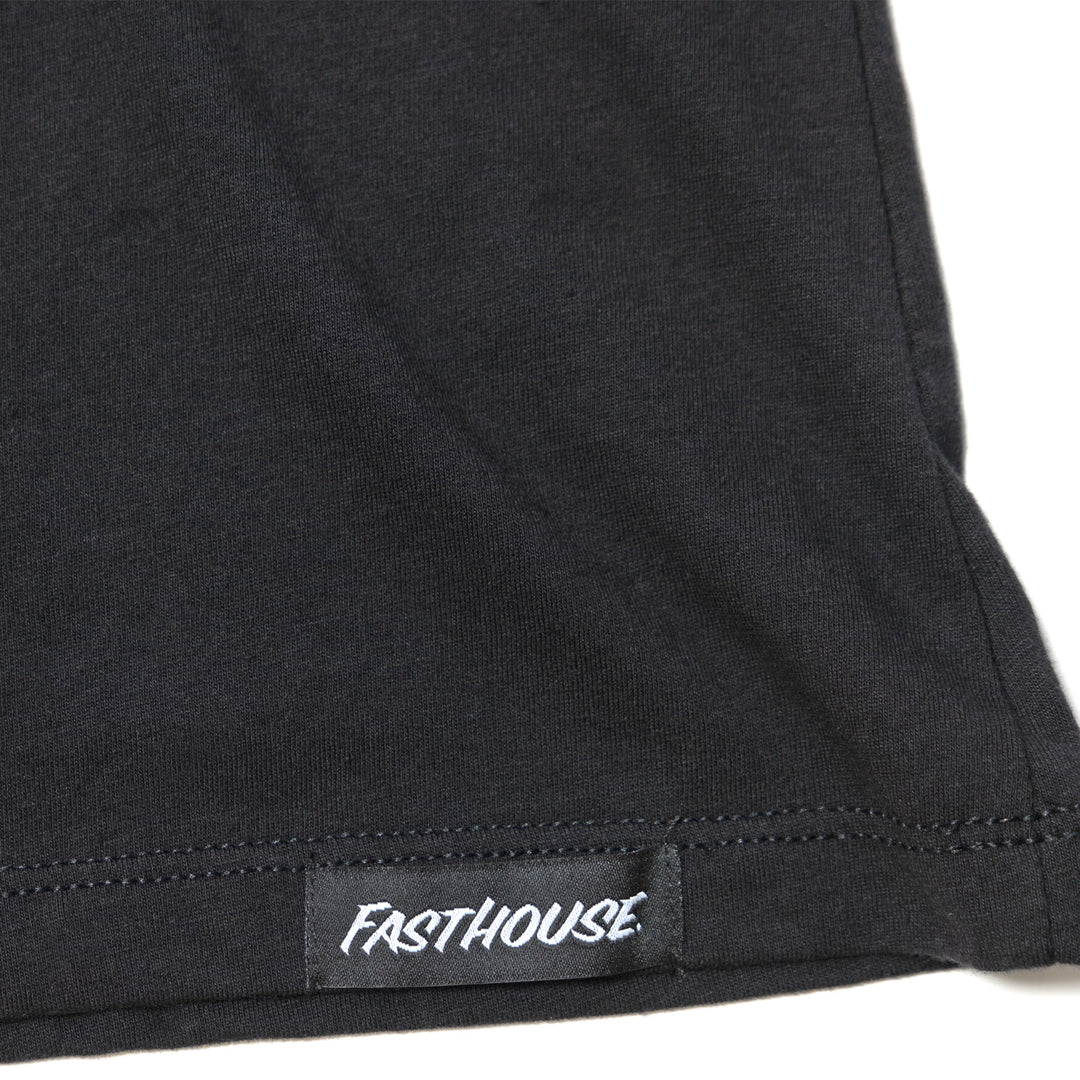 Fasthouse Women's Sun Struck SS Tee Black - Close-Up of Brand Tag on Hem