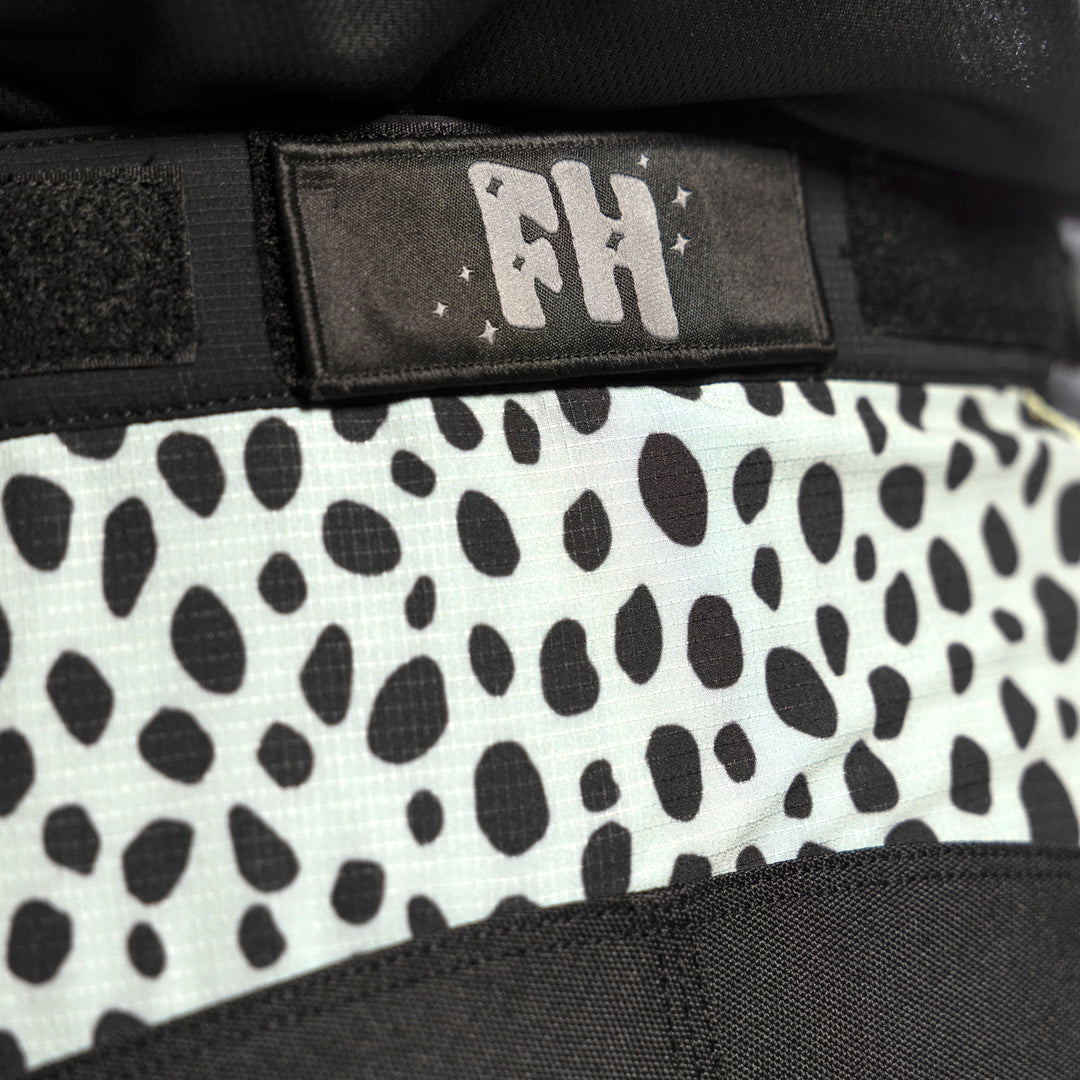 Fasthouse Women's Speed Style Zenith Pant Black - Close-Up of Rear Waist Details and Graphic