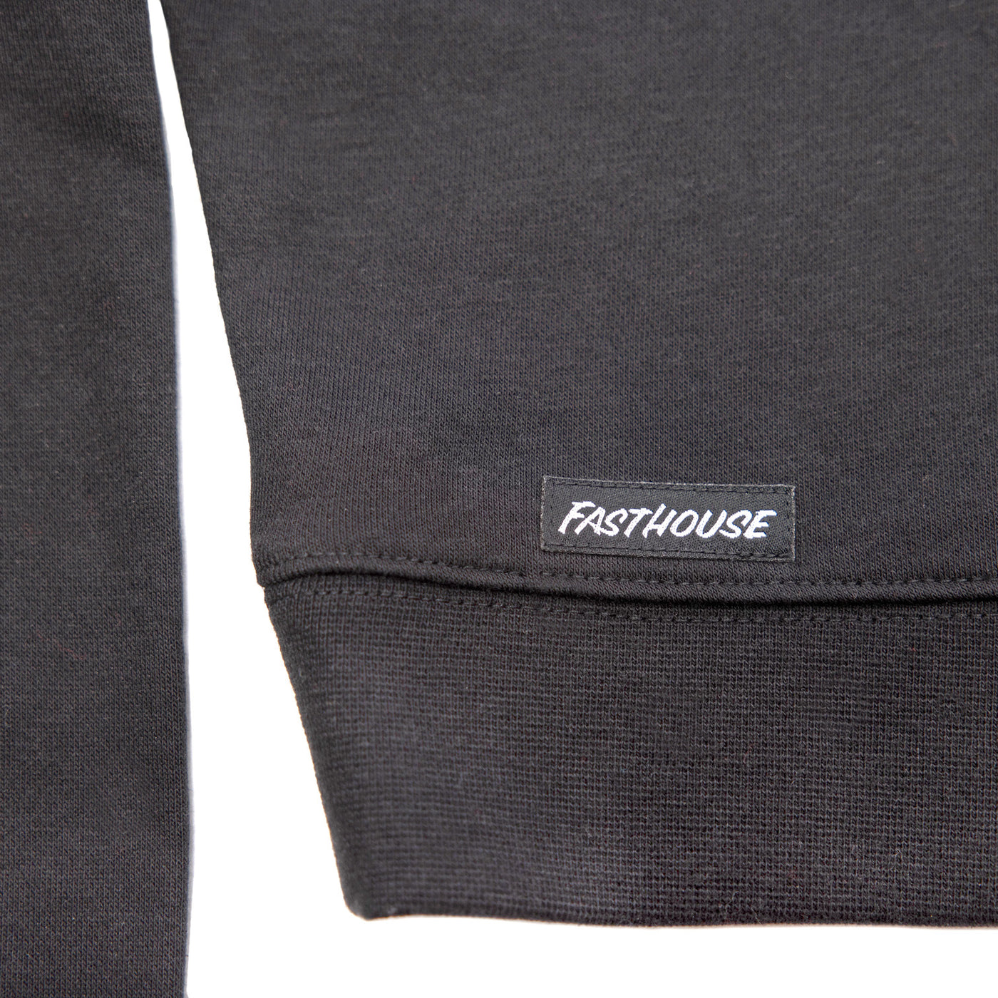 Fasthouse Women's Renown Crew Neck Crop Pullover Black - Close-Up of Logo Tag on Hem