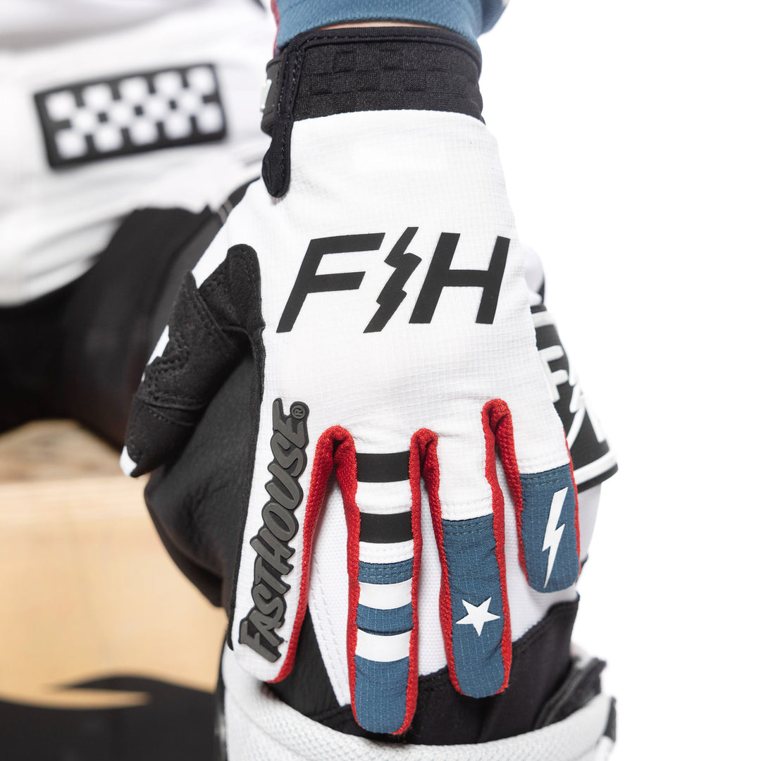 Fasthouse Women's Speed Style Anthem Gloves White/Teal - Close-Up of Left Gloved Hand Resting on Knee