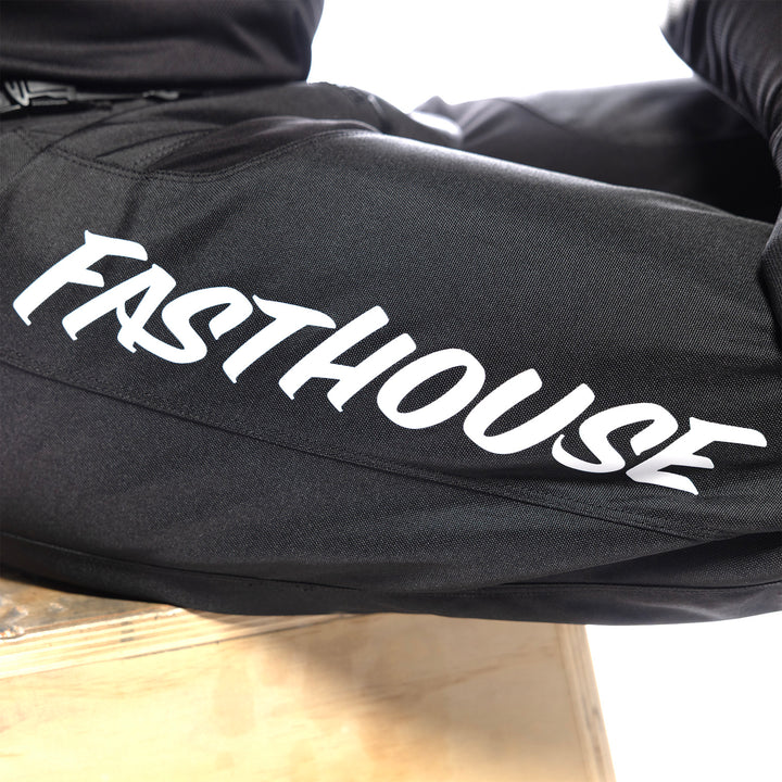Fasthouse Youth Carbon Method Pants Black - Close-Up of Right Thigh Graphics