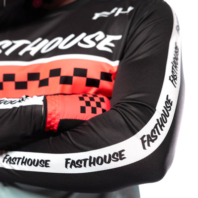 Fasthouse Youth Elrod Formula Jersey Oceanic Mint/Hyper Coral - Close-Up of Left Sleeve Graphics