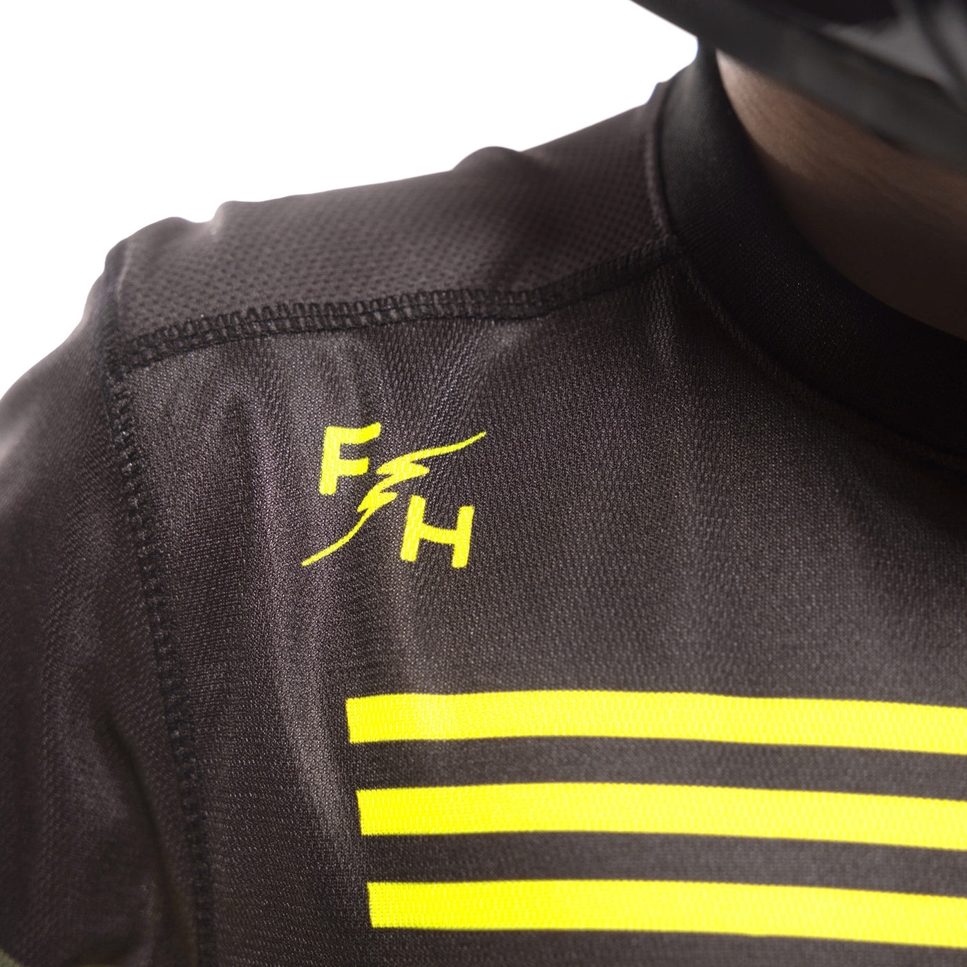 Fasthouse Youth Elrod Hypersonic Jersey Hi-Viz - Close-Up of Shoulder Chest Graphic