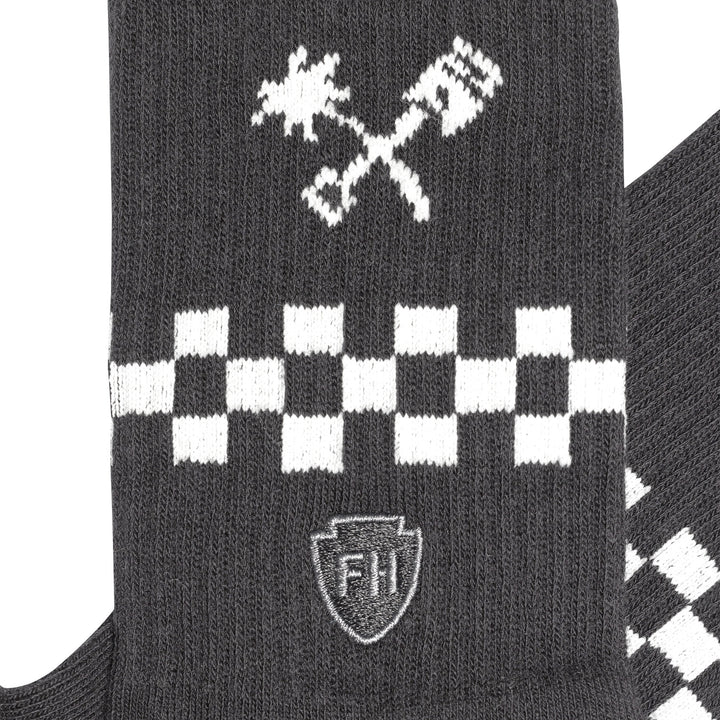 Fasthouse Youth Gold Mine Crew Socks Black - Close-Up of Graphic on Side