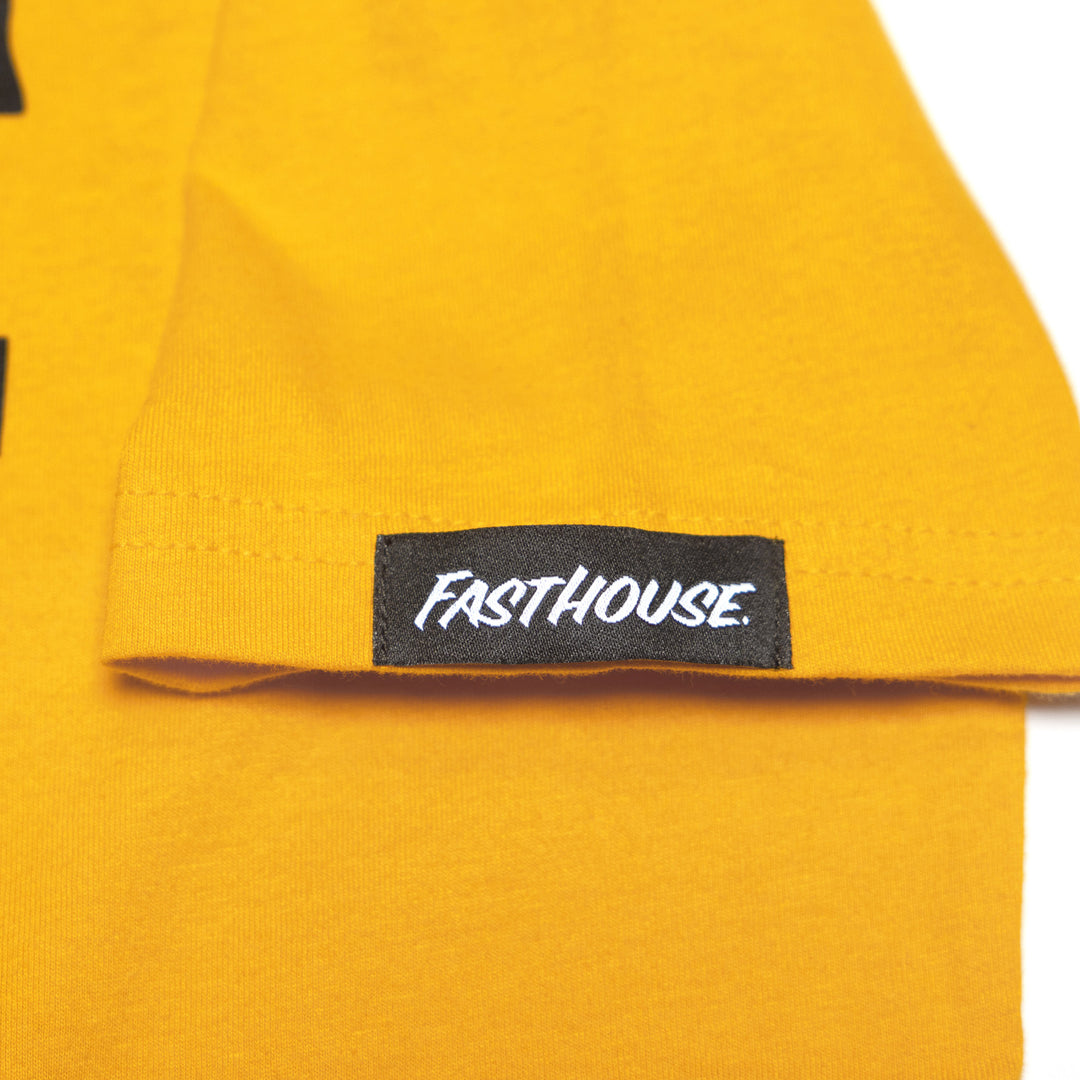 Fasthouse Youth Gold Mine SS Tee Vintage Gold - Close-Up of Brand Tag on Sleeve
