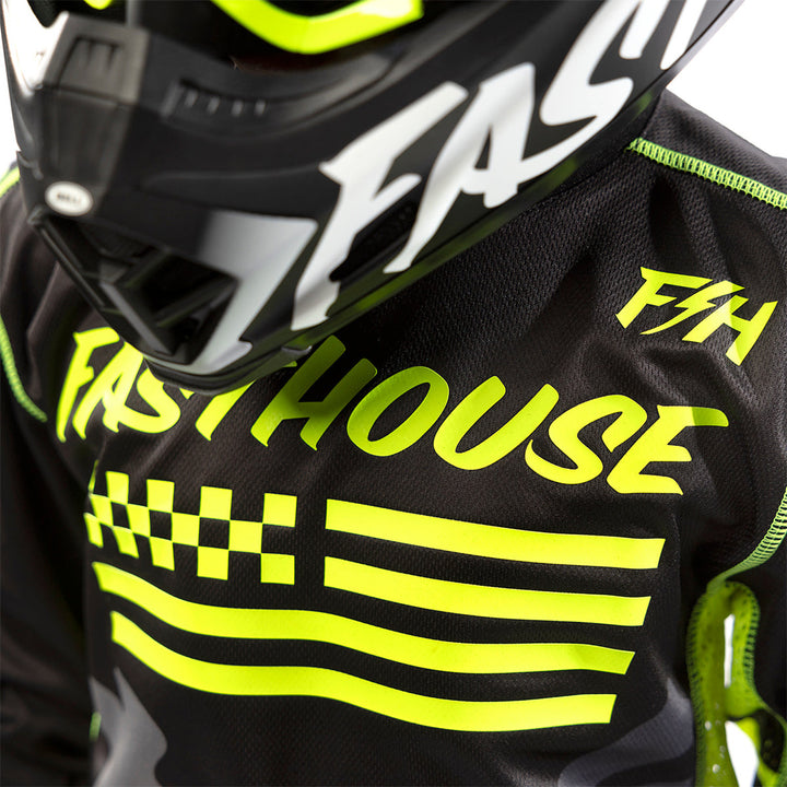Fasthouse Youth Grindhouse Riot Jersey Black/Hi-Viz - Close-Up of Chest Graphics