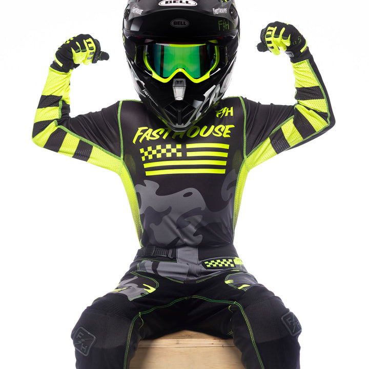 Fasthouse Youth Grindhouse Riot Jersey Black/Hi-Viz - Front View of Model Wearing Jersey