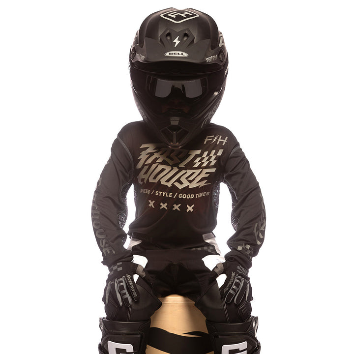 Fasthouse Youth Grindhouse Rufio Jersey Black - Front View of Model Wearing Jersey