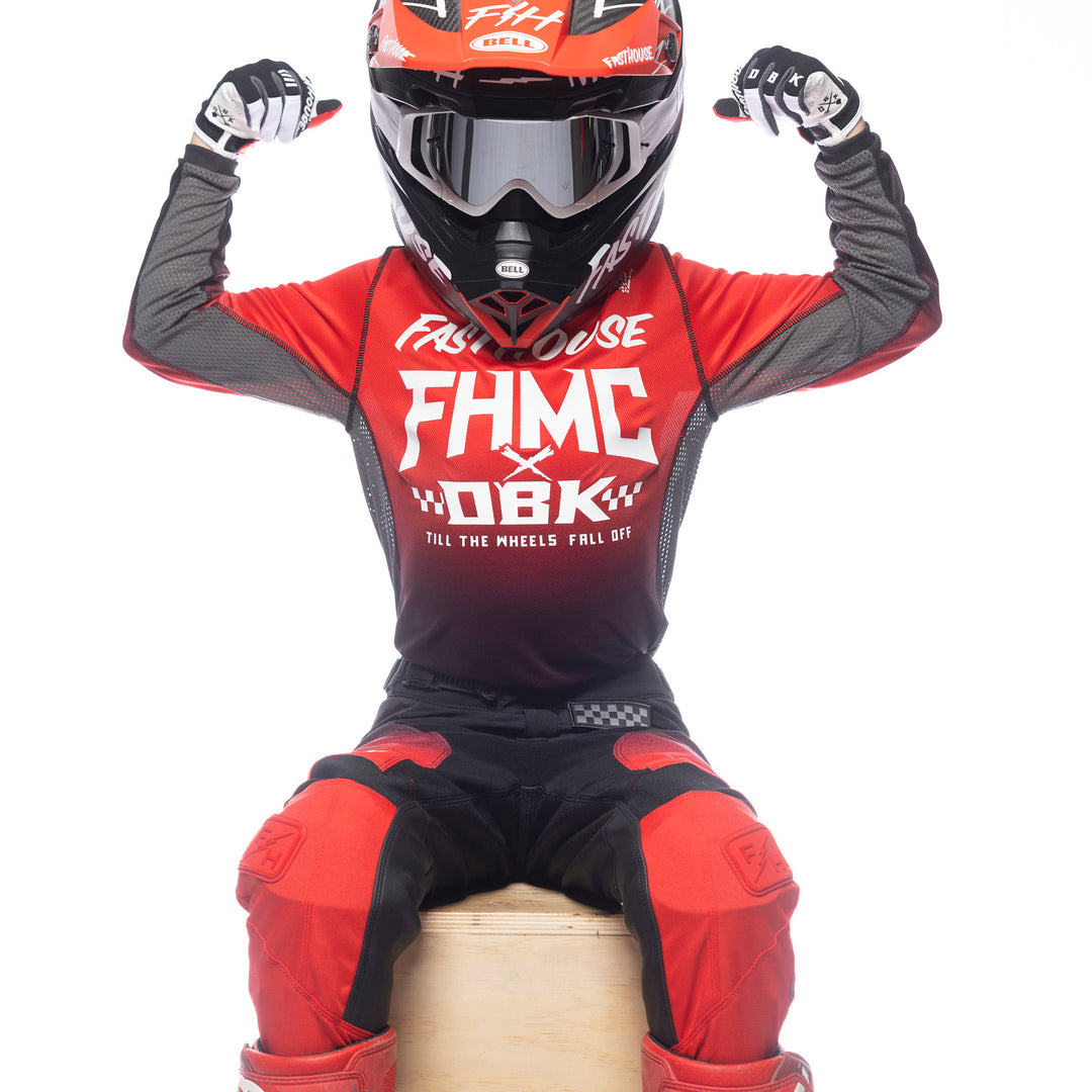 Fasthouse Youth Grindhouse Twitch Jersey Red/Black - Front View of Model Wearing Jersey