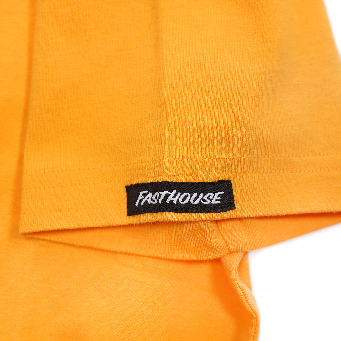 Fasthouse Youth Ignite Tee Vintage Gold - Close-Up of Tag Sewn into Sleeve Hem