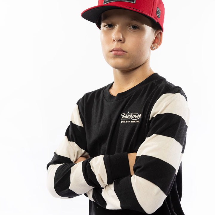 Fasthouse Youth Jailbreak Stripe Long Sleeve Tee Black - Front Side View of Model Wearing Tee