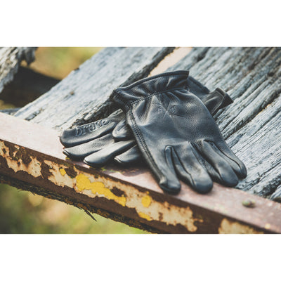 Highway 21 Louie Gloves Black - Lifestyle Shot of Gloves set down on Wooden Table