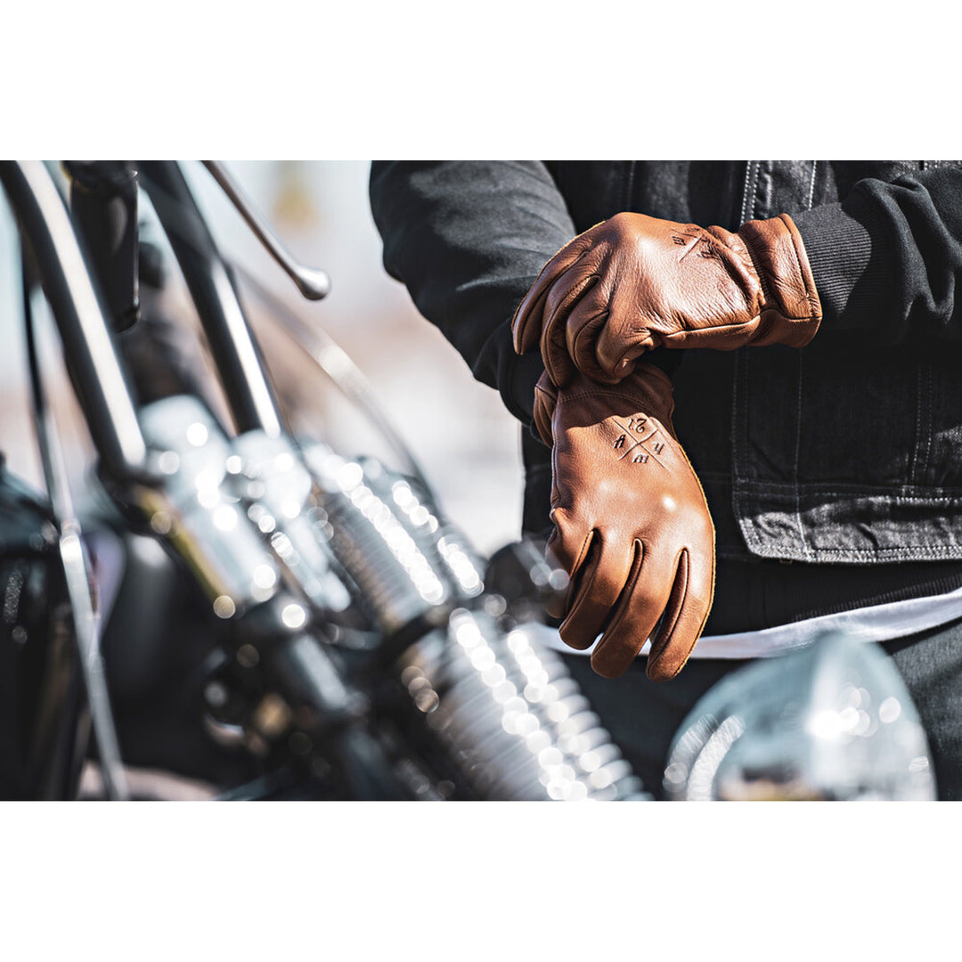 Highway 21 Louie Gloves Brown - Lifestyle Close-Up of Rider Pulling On Gloves