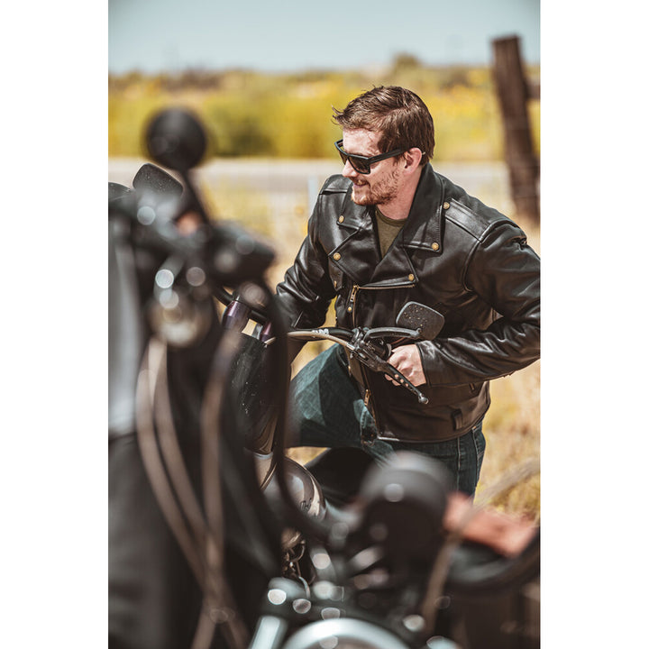 Highway 21 Murtaugh Jacket Black - Lifestyle of Rider Mounting Motorcycle while Wearing Jacket