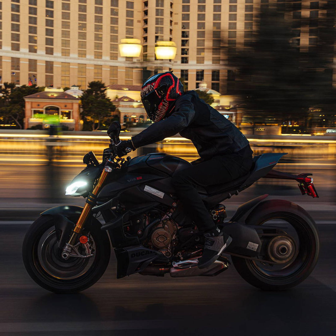 HJC RPHA 12N Venom III Helmet MC-1SF - Lifestyle of Rider Wearing Helmet while Speeding Along City Street