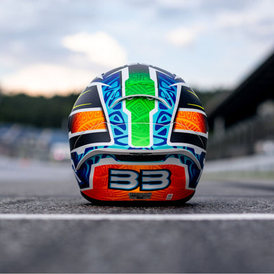 HJC RPHA 1N Brad Binder Helmet MC-27SF - Lifestyle Shot of Helmet Resting on Track, Rear View