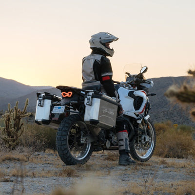 HJC RPHA 60 Solid Helmet Sand Beige - Lifestyle Shot of Rider in Helmet sitting on adventure motorcycle
