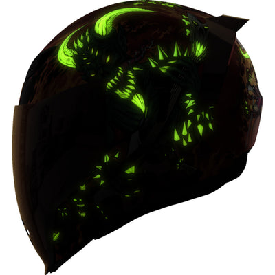 ICON Airflite Blegh MIPS Helmet Red - Left Side View of Glow-in-the-Dark Graphics