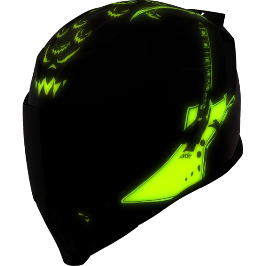 ICON Airflite Trick or Street 4 Helmet Black - Front Left Side View of Glow-in-the-Dark Graphics