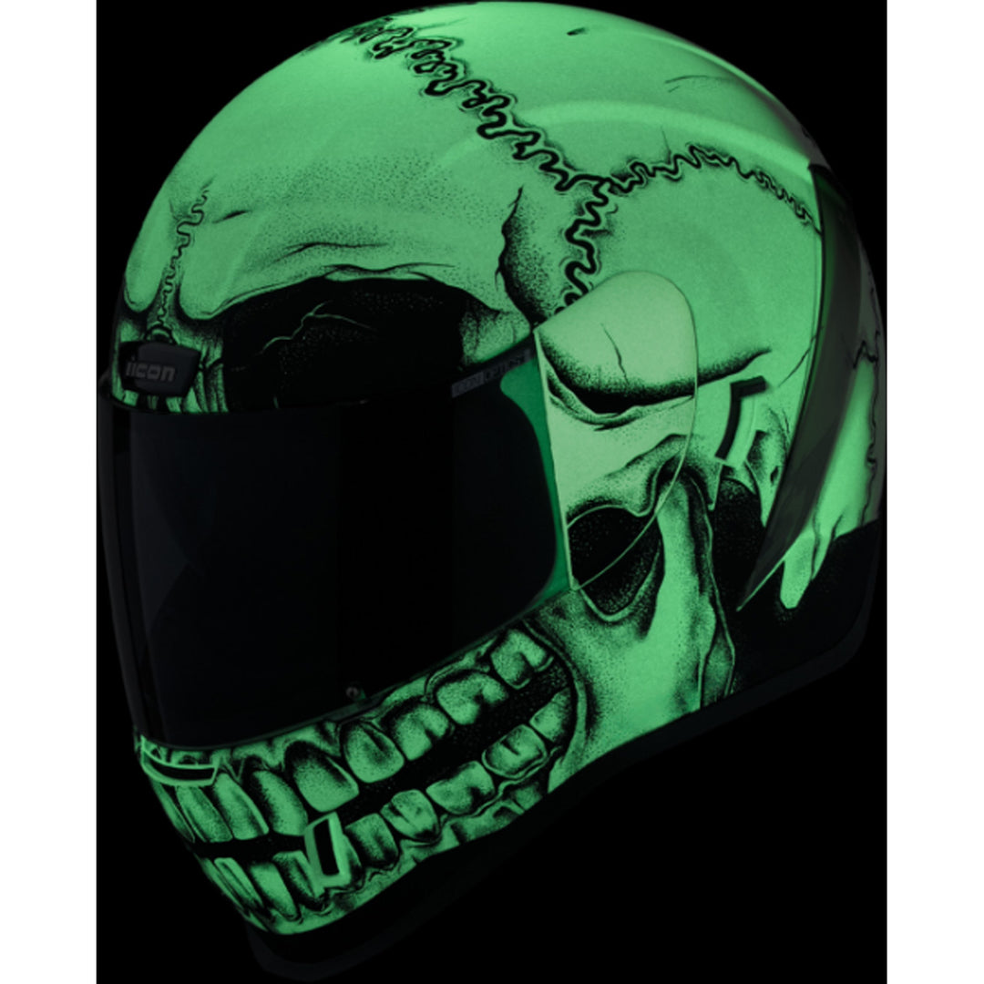 ICON Airform Crestfallen MIPS Helmet White - Front Left Side View of Glow-in-the-Dark Graphics