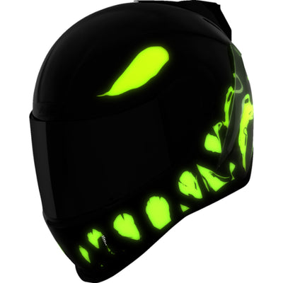 ICON Airform Manik'RR MIPS Helmet Dark Black - Front Left Side View with Glow-in-the-Dark Graphics