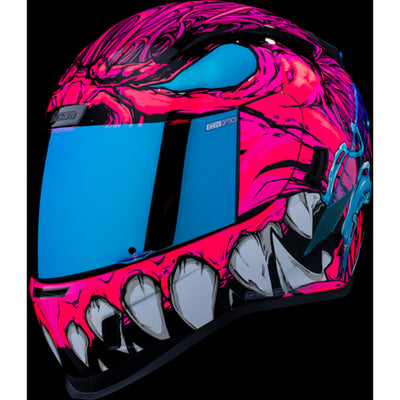 ICON Airform Manik'RR MIPS Helmet Pink - Front Left Side View with Dark Studio Background