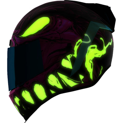 ICON Airform Manik'RR MIPS Helmet Pink - Left Side View with Glow-in-the-Dark Graphics