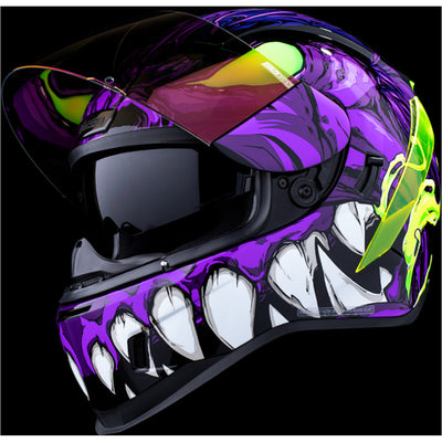 ICON Airform Manik'RR MIPS Helmet Purple - Front Left Side View with Dark Studio Background, Faceshield Raised, and Drop Down Sun Visor Lowered