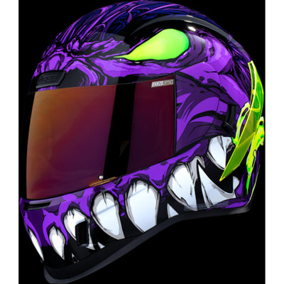 ICON Airform Manik'RR MIPS Helmet Purple - Front Left Side View with Dark Studio Background