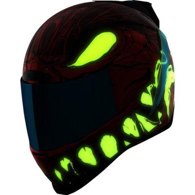 ICON Airform Manik'RR MIPS Helmet Red - Front Left Side View with Glow-in-the-Dark Graphics