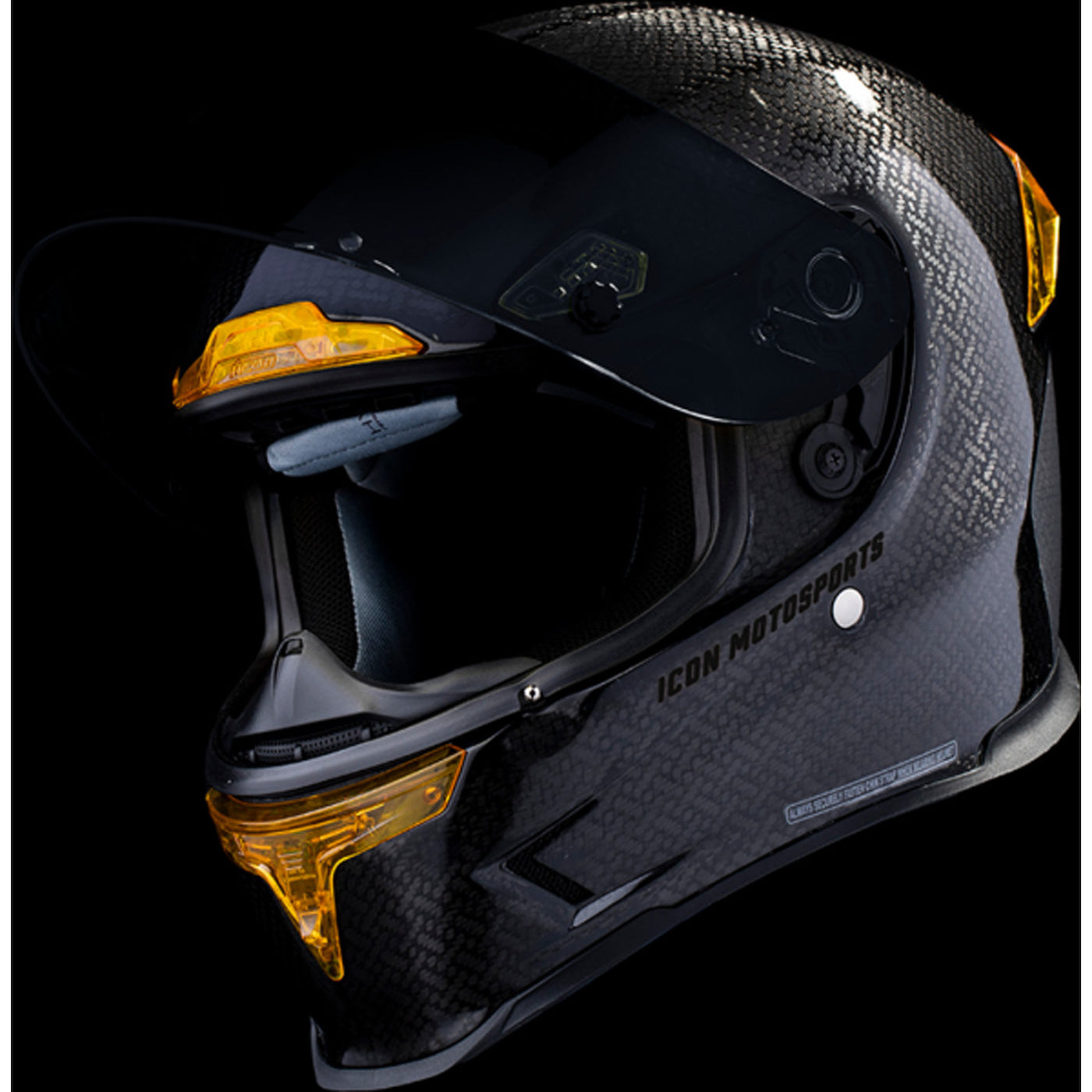 ICON Airframe Pro Carbon 4Tress Helmet Yellow - Front Left Side View with Dark Studio Background and Faceshield Raised