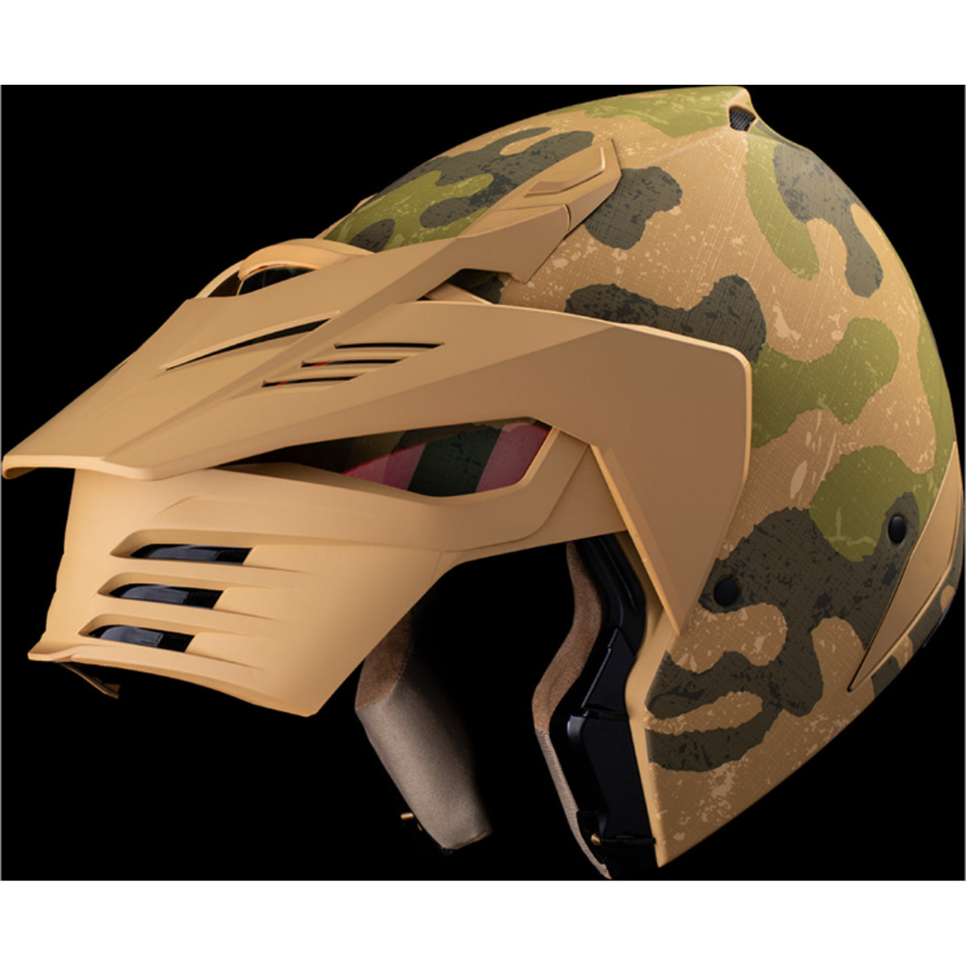 ICON Elsinore Magnacross Helmet Tan - Front Left Side View with Dark Studio Background and Chin Bar Raised