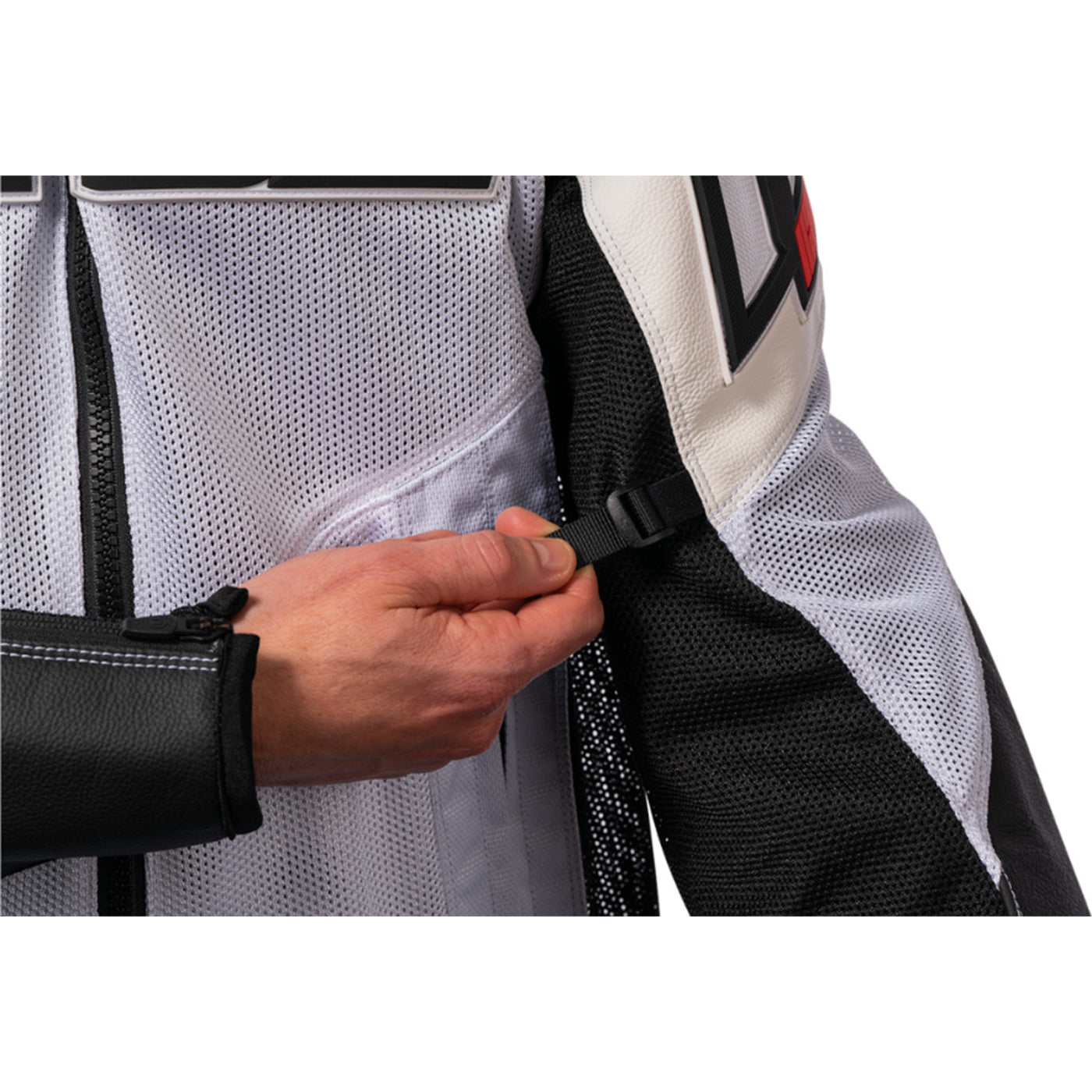 ICON Mesh AF Leather Jacket White - Close-up of Arm Adjuster Strap