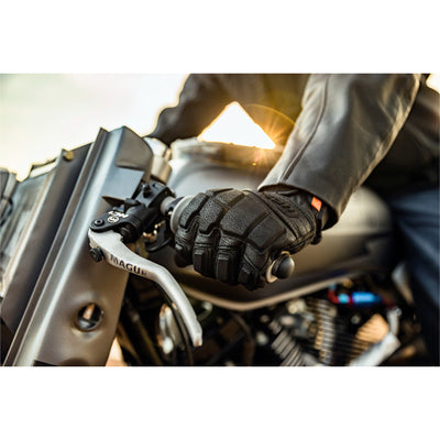 ICON Motorhead3 CE Gloves Black - Lifestyle Close-Up of Gloved Hand Gripping Clutch Side Grip