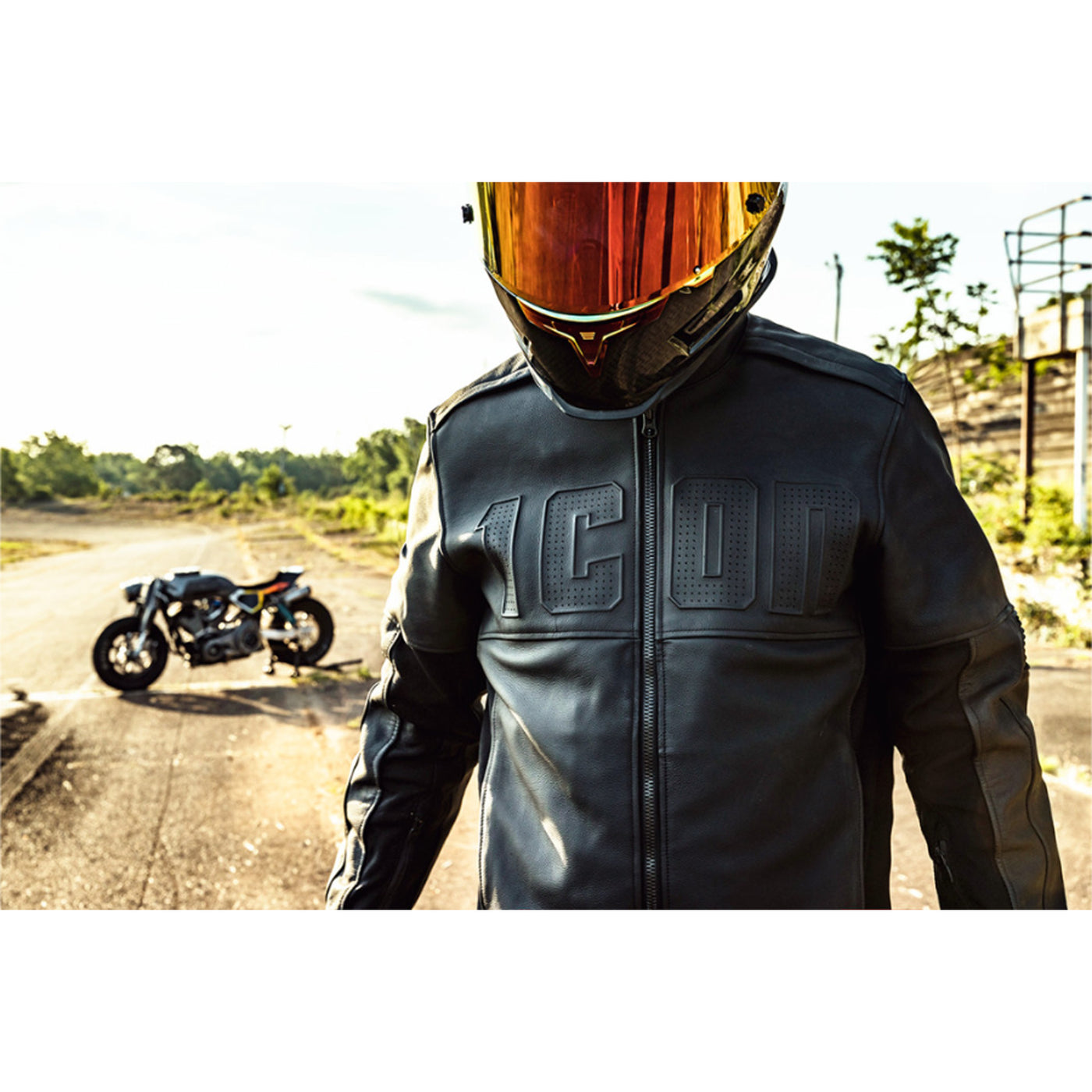 ICON Motorhead3 Jacket Black - Lifestyle Shot of Rider in Jacket walking from Motorcycle