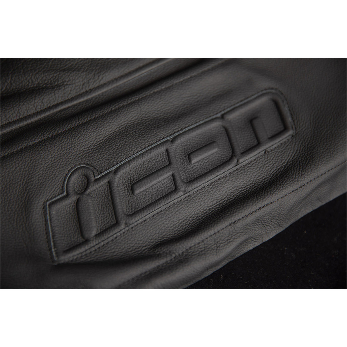 ICON Motorhead3 Jacket Black - Close-Up of Logo Imprint on Lower Back