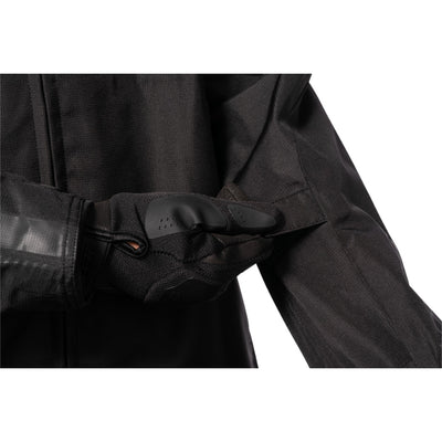 ICON PDX3 Jacket Black - Close-Up of Model Adjusting Arm Strap