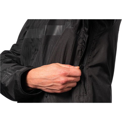 ICON PDX3 Jacket Black - Close-Up of Model Closing Armpit Vent