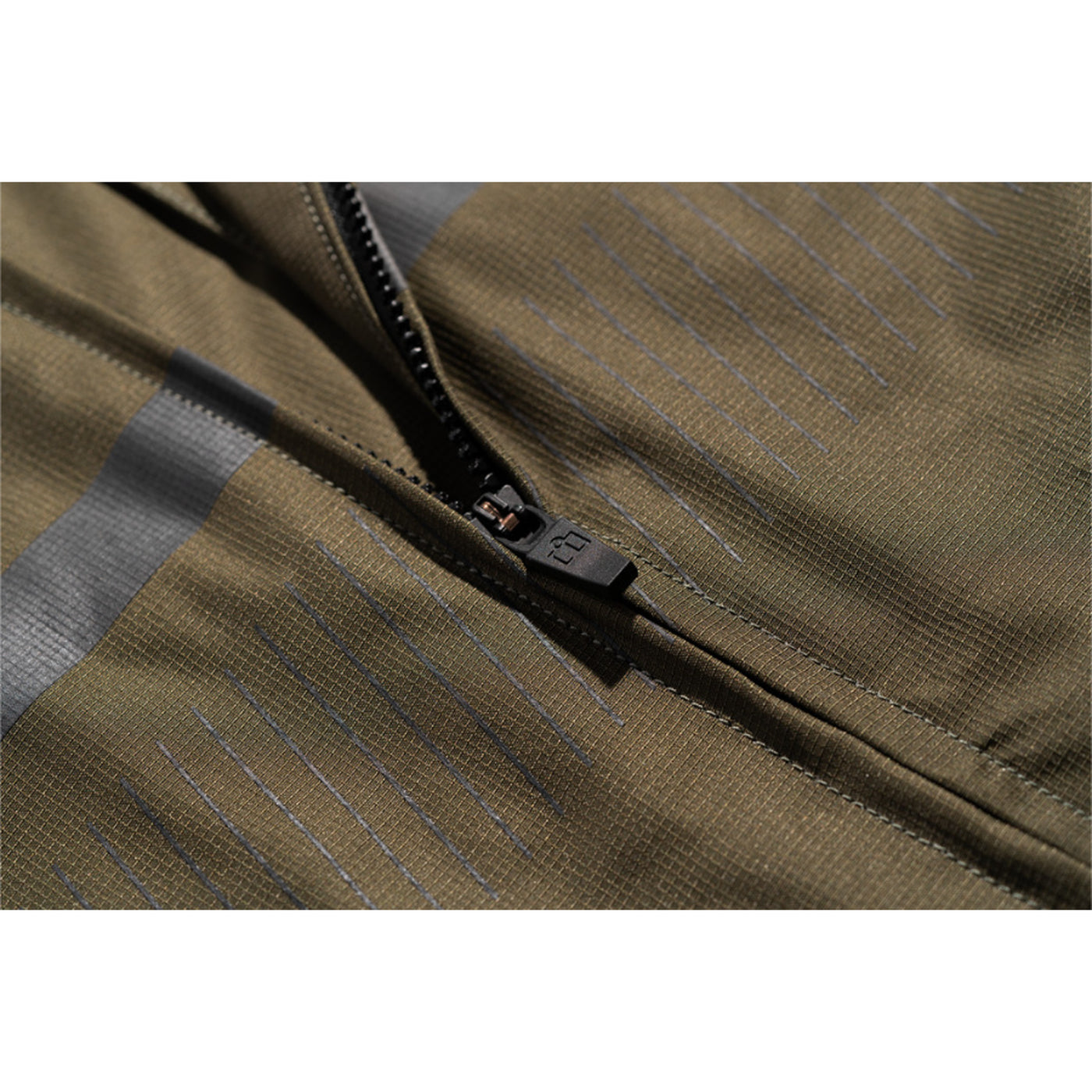 ICON PDX3 Jacket Olive - Close-Up of Partially Unzipped Front Zipper