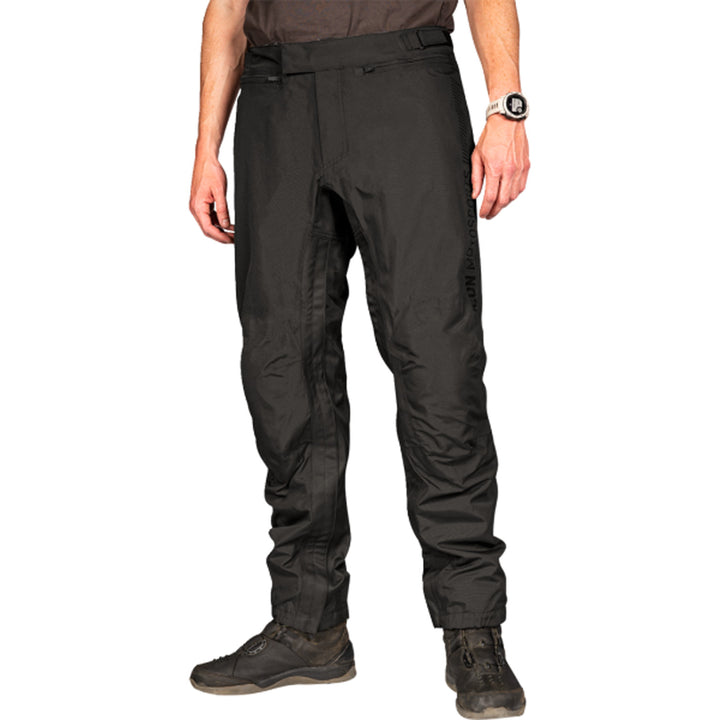 ICON PDX3 Overpant Black - Front View of Model Posing in Overpant