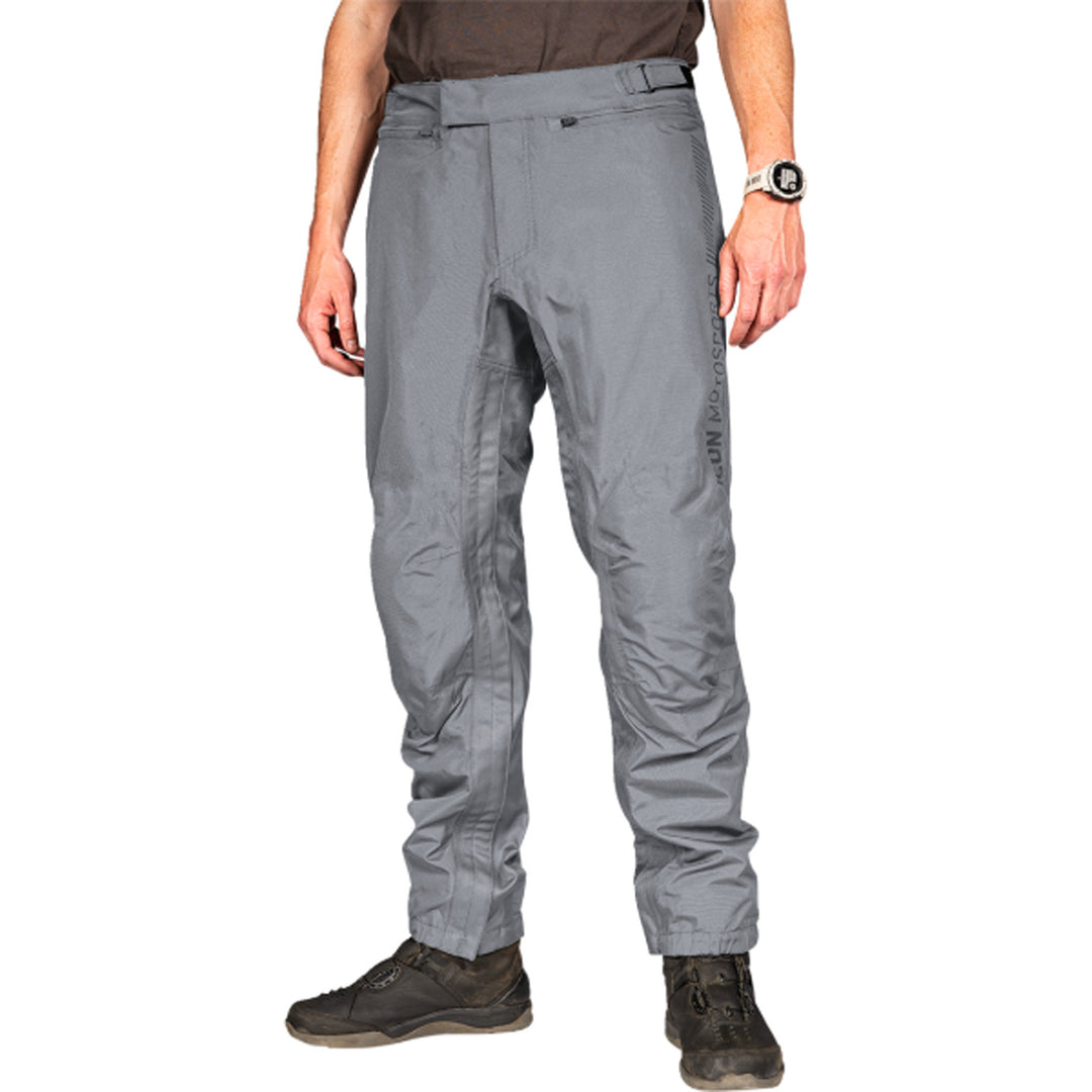 ICON PDX3 Overpant Gray - Front View of Model Posing in Overpant