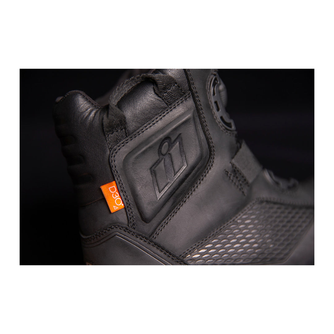 ICON Stormhawk Boots Black - Close-Up of Ankle Protector with Logo Imprint