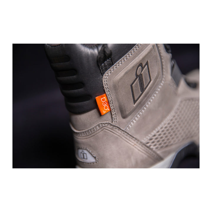 ICON Stormhawk Boots Gray - Close-Up of Ankle Protector with Logo Imprint