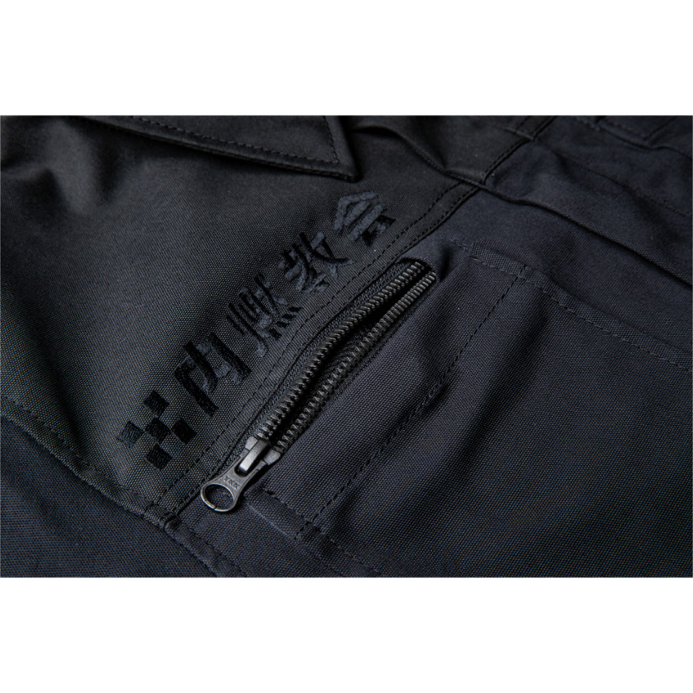 ICON Upstate Canvas National Jacket Black - Close-Up of Open Zippered Pocket Above Chest Pocket