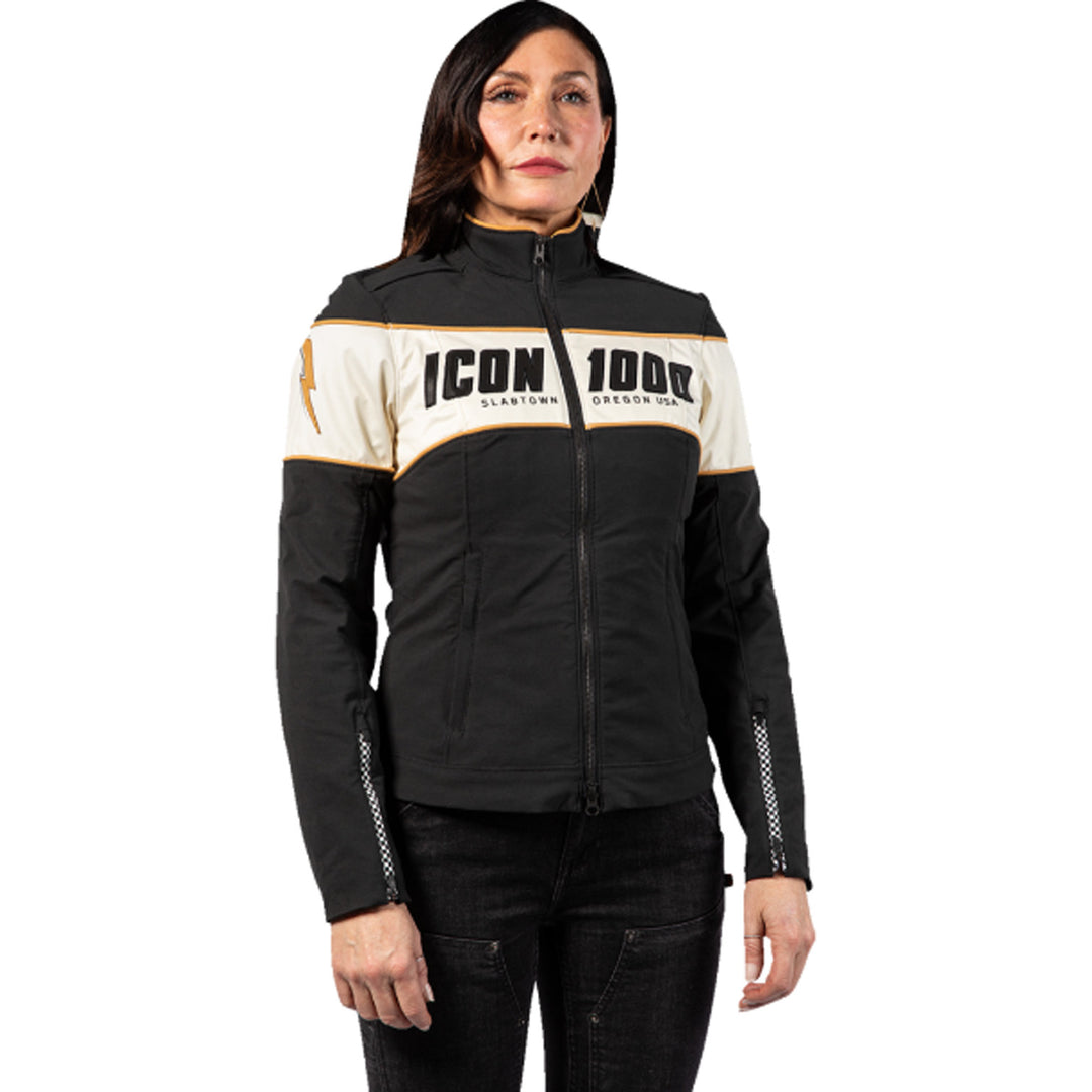 ICON Women's Hella 4 Jacket Black - Front View of Model Posing in Jacket