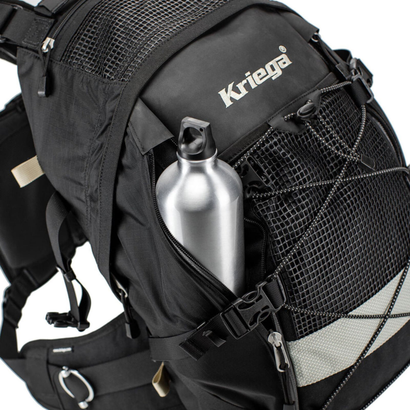 Kriega R35 Backpack - Close-Up of Water Bottle Placed into Side Zippered Pocket