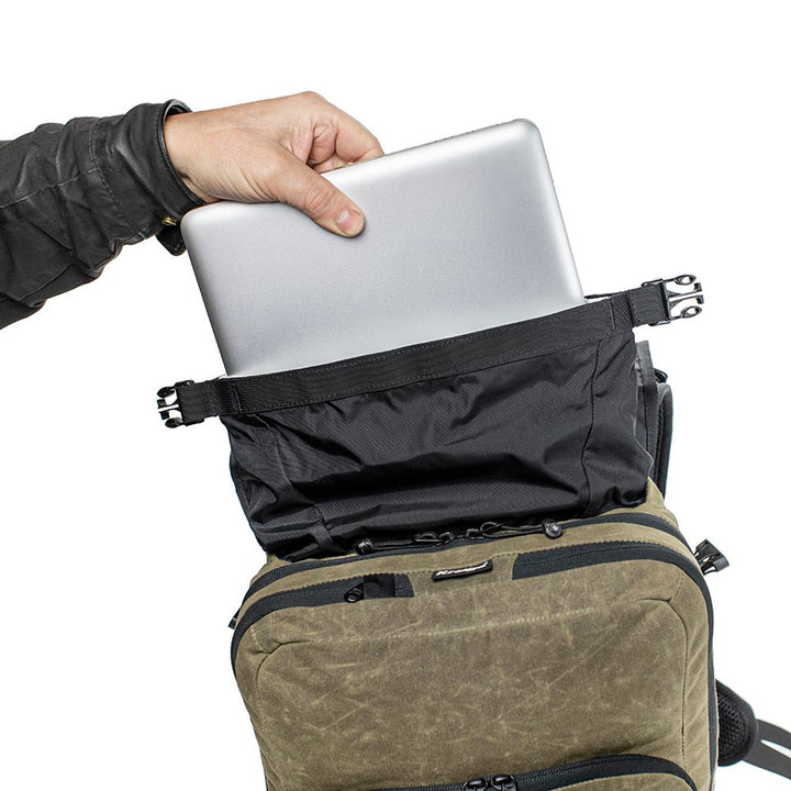 Kriega Roam 34 Backpack Ranger - Close-Up of Model Pulling Laptop Out of Top Section