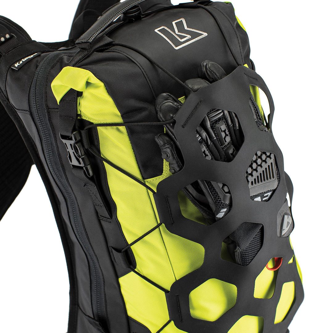 Kriega Trail 18 Adventure Backpack Lime - Close-Up of Gloves Packed into Front Lace Pocket